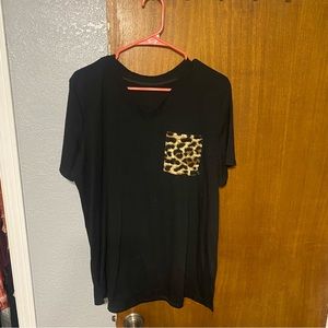 Cute simple black v neck with cheetah print pocket